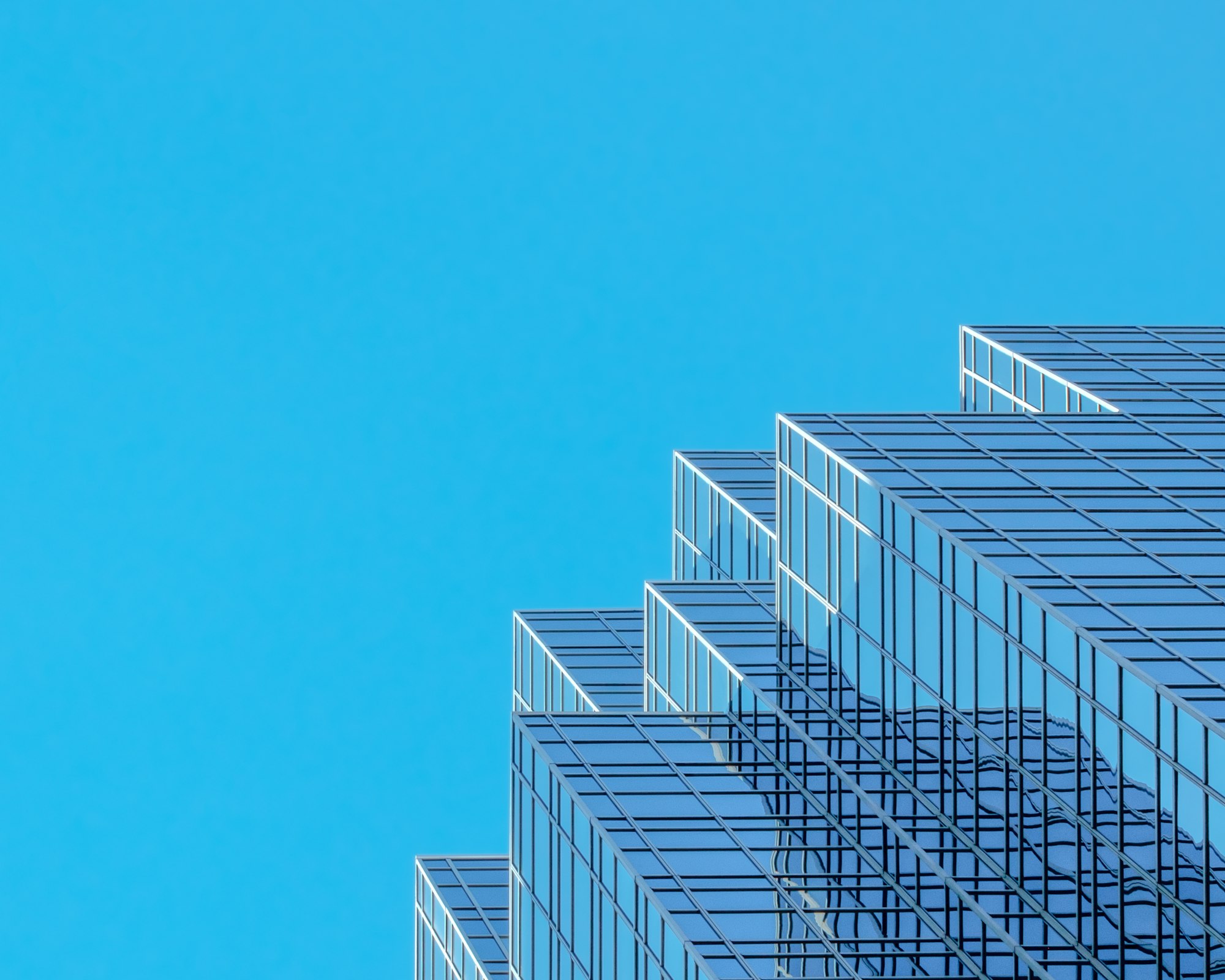Institutional glass architecture representing digital financial infrastructure